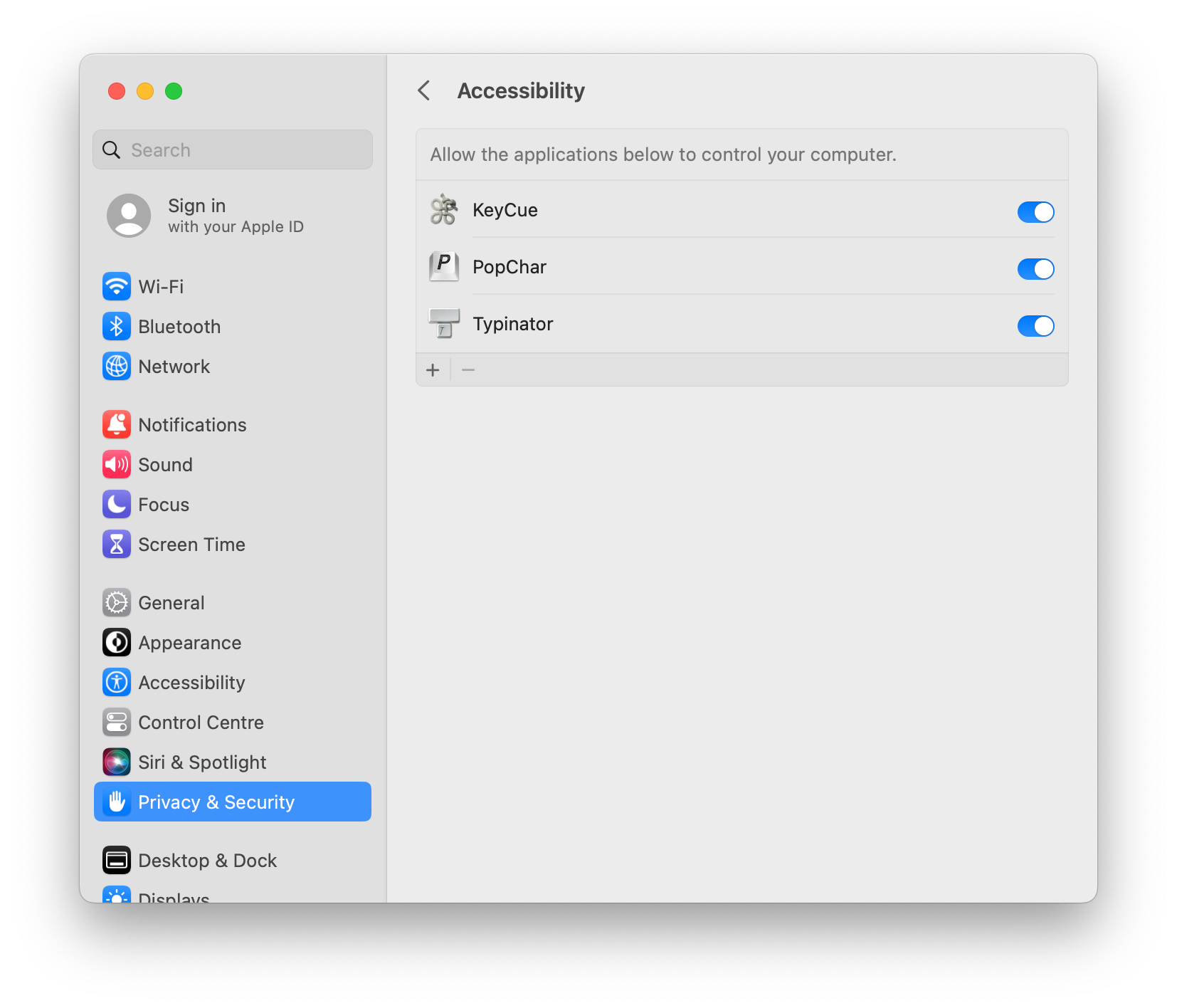 macOS Privacy & Security settings showing Accessibility permissions with Typinator, PopChar, and KeyCue enabled — example of allowing Typinator to control your computer for text expansion features.