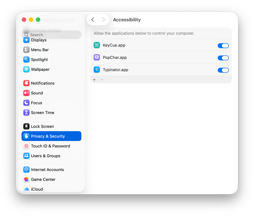 Screenshot of macOS System Settings in the ‘Privacy & Security’ section, showing the ‘Accessibility’ panel. A list of apps (KeyCue.app, PopChar.app, and Typinator.app) is displayed with toggle switches enabled to allow them to control the computer. A sidebar on the left shows other settings categories such as Displays, Notifications, Sound, and Users & Groups.
